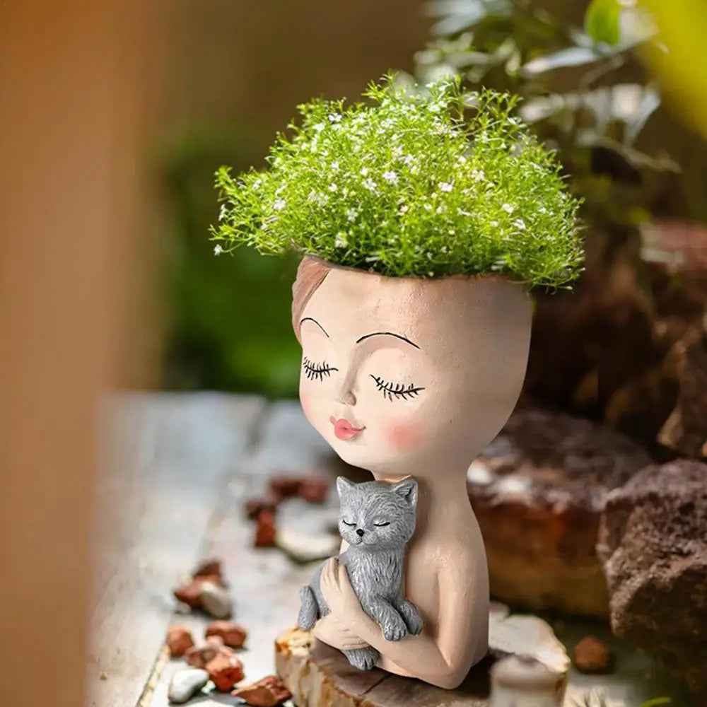 Pot en résine Jeune fille avec son animal de compagnie